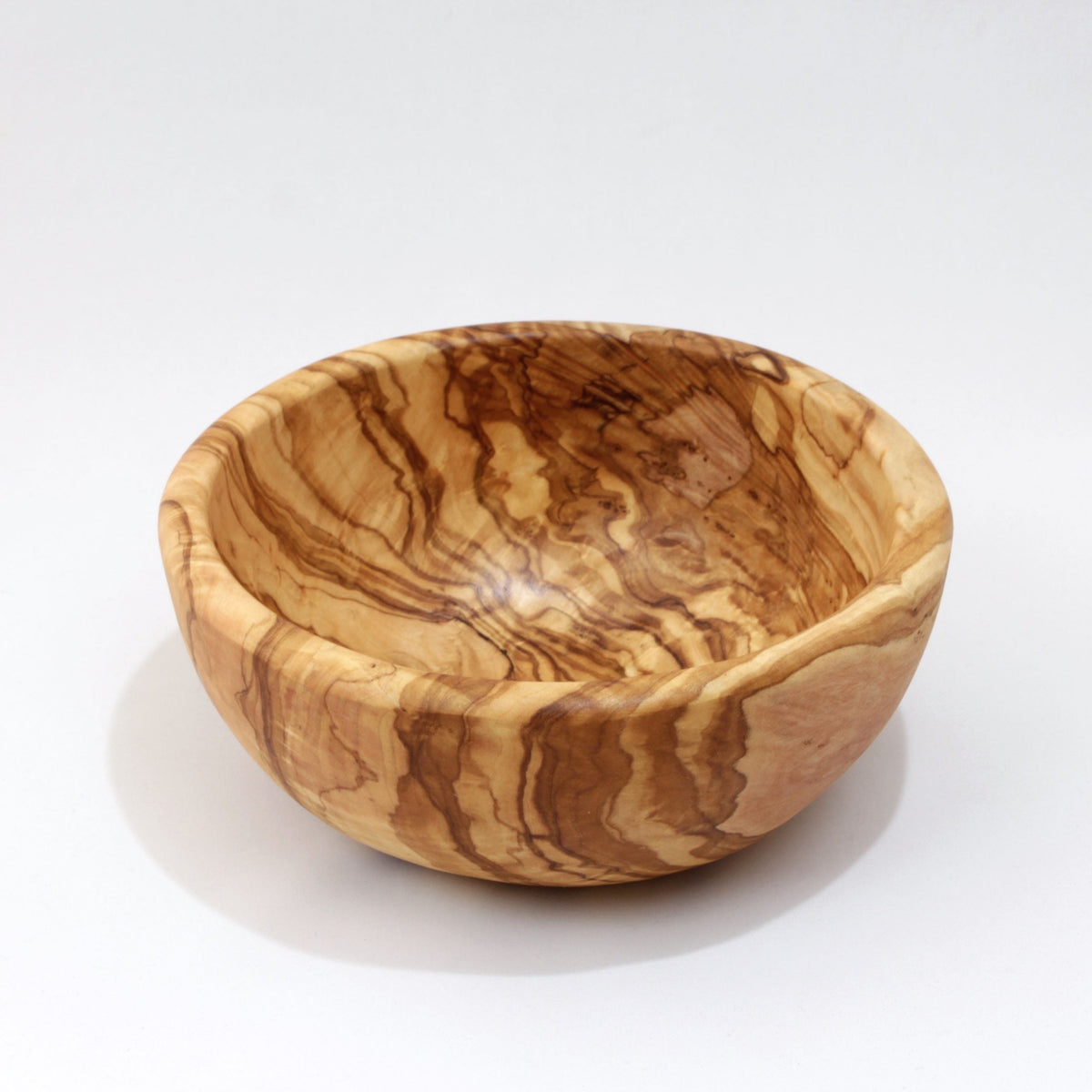 Rund drejet skål, diameter 12cm, dybde 3,5cm i oliventræ