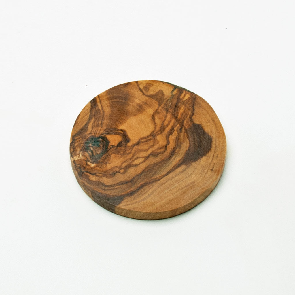 Glasbrikker, diameter 7,3 cm, højde 8 mm. i oliventræ